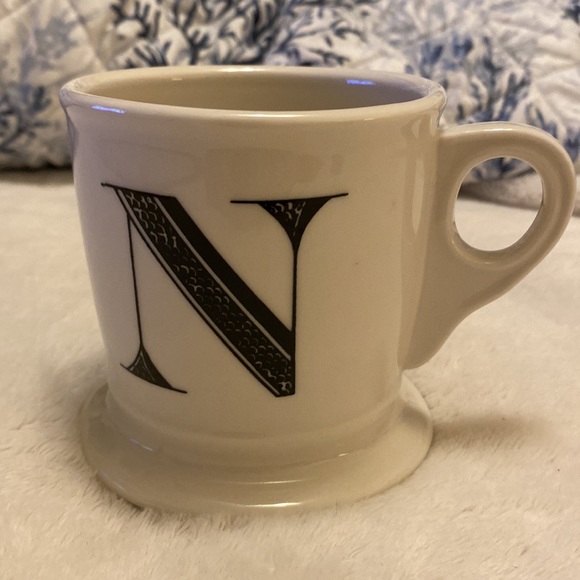 Black and white decorative mug with the capital letter N stamped on the bottom - Picture 7 of 12